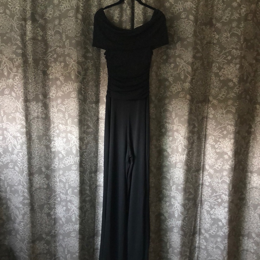 Black off the shoulder jumpsuit.
